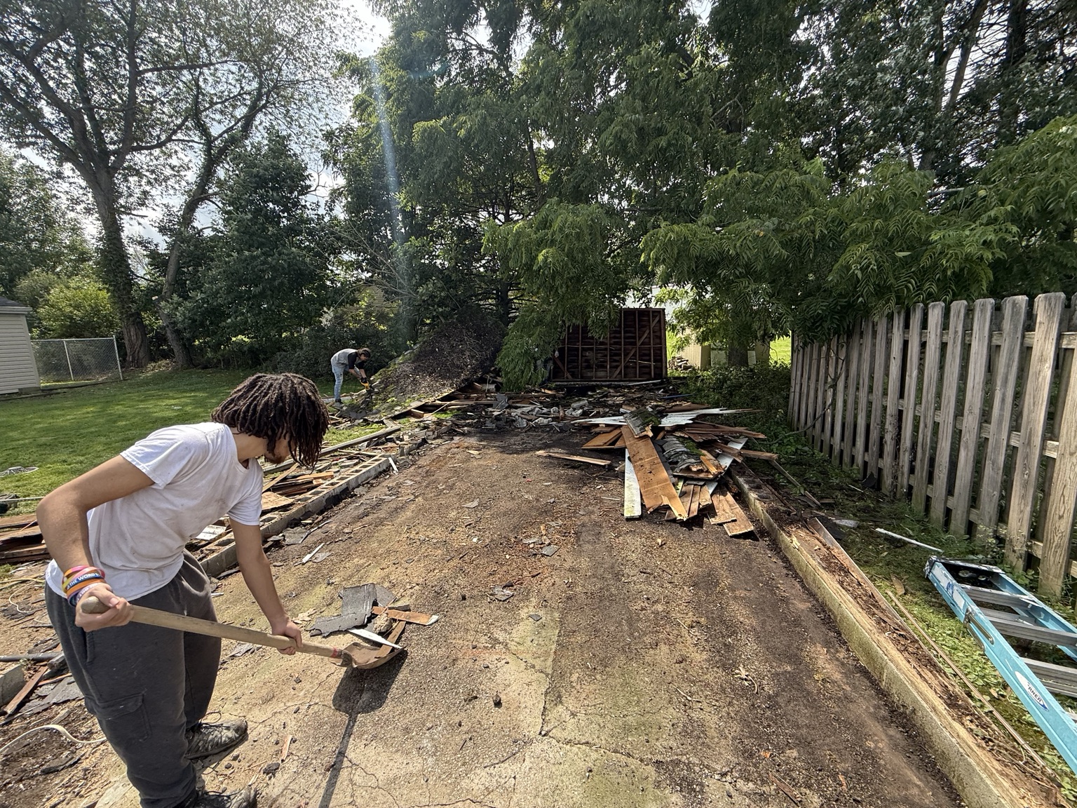 Detached garage demolition in progress