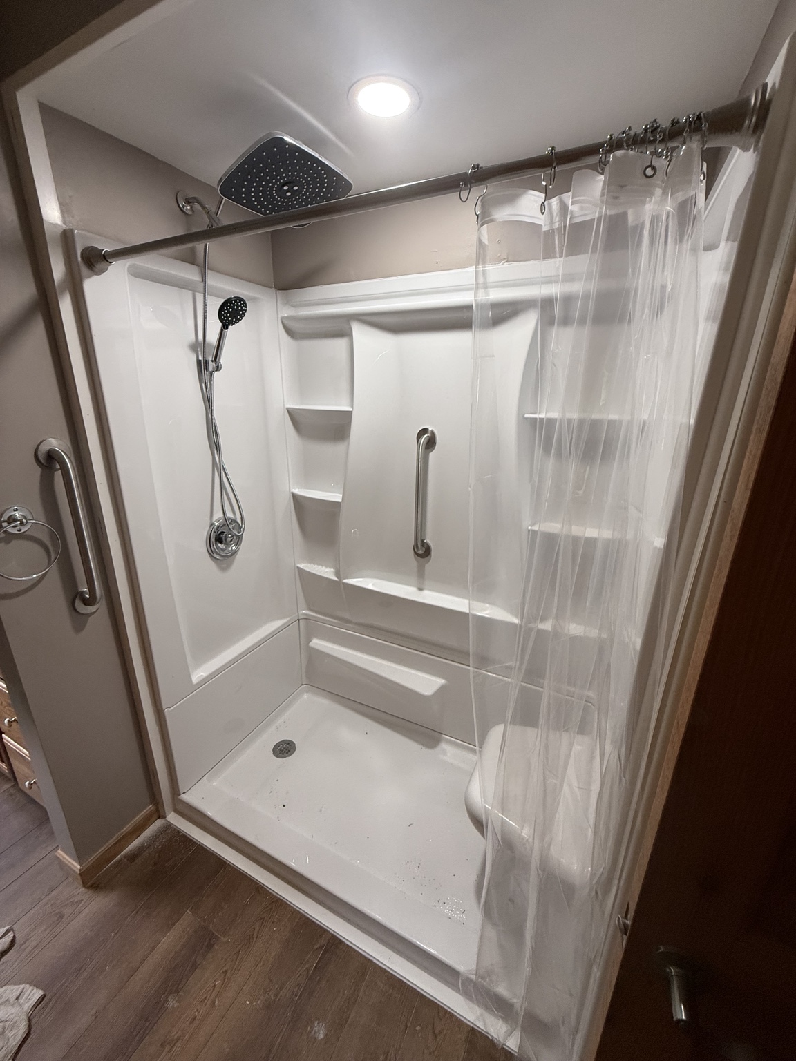 Completed walk-in shower installation by Tri County Renovations